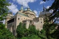 View on medieval Bojnice castle with gothic tower and colorful r