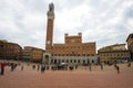 Palazzo Publico in Piazza del Campo, cloudy day. Siena, Italy Royalty Free Stock Photo