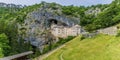 A view of the medieval castle built into the cliff face at Predjama, Slovenia Royalty Free Stock Photo