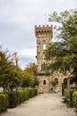 View of the medieval fortress tower from the alley in the city park in Greve In Chianti, Tuscany, Italy Royalty Free Stock Photo