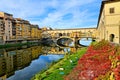 Medieval Ponte Vecchio with reflections during autumn, Florence, Tuscany, Italy Royalty Free Stock Photo