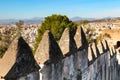 The view on medieval rampart with battlements of historical Gibralfaro castle, located on the city hill of Malaga, Spain