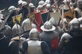 View of a medieval reenactment with knights with swords, shields, and armor