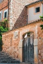 View of a medieval street in the Old Town of the picturesque Spanish-style village Fornalutx, Majorc Royalty Free Stock Photo
