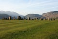 View of megalithic Castlerigg stone circle in the green field under the blue sky