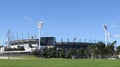 View of the Melbourne Cricket Ground with green grass and blue sky background on a sunny day Royalty Free Stock Photo