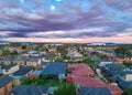view of Melbournes suburbs and CBD looking down at Houses roads and Parks Victoria Australia. Beautiful colours at Sunset Royalty Free Stock Photo