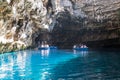 Rowing boat in the Melissani Cave of the nymphs in Kefalonia, Greece Royalty Free Stock Photo