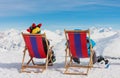 View of men resting on chair in mountains Royalty Free Stock Photo