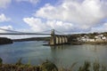 View of the Menai Suspension Bridge, Menai Strait & Town of Menai Bridge, Anglesey, North Wales Royalty Free Stock Photo