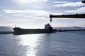 View on the merchant ship moored along concrete breakwater from Algeciras, Spain, container terminal. Royalty Free Stock Photo