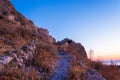 Old trail to the top of Mesa Vouno mountain at dawn Santorini Greece Royalty Free Stock Photo