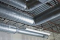 A view of bend air ducts in a warehouse