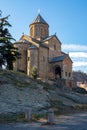 View Metekhi Church in the morning above the Kura river in Tbilisi