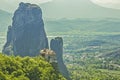 The view of Meteora with Holy Monastery of Roussanou sit precipitously on mountain rocky boulder at Thesally, Greece. Royalty Free Stock Photo