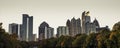 A view of the midtown Atlanta skyline from the nostalgic Piedmont Park. Royalty Free Stock Photo