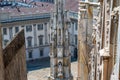 View from the Milan Cathedral internal stairways looking outside to the column and courtyard