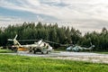 View military helicopters at the airfield in the village of Gore