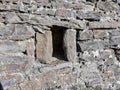 View of the millenary window. Hermitage of San Benito, in Orante & x28;Huesca - Spain& x29; . October 2017