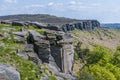 A view of the millstone rock face on the Stanage Edge escarpment in the Peak District, UK Royalty Free Stock Photo