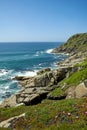 View from Minack, Cornwall, overlooking the sea and wild flowers.