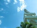 the view of the minaret of the mosque against the blue sky Royalty Free Stock Photo