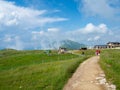 The view of mini zoo and restuarant in the mountains of Monte Baldo in Malcesine in Italy in a green meadow