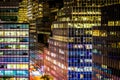 View of modern architecture along 51st Street at night, in Manhattan, New York. Royalty Free Stock Photo