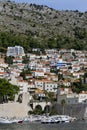 View of modern buildings and villas on the sea coast, on mountain background in Dubrovnik, Croatia