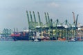 View of modern and busy Singapore Tanjong Pagar PSA ports serving cargo ships