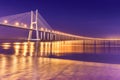 View of a modern cable-stayed bridge at night Vasco da Gama Bridge, Lisbon, Portugal Royalty Free Stock Photo