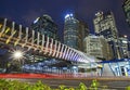 View of modern crossing bridge with interesting design in the busy Sudirman Street, Jakarta, Indonesia.