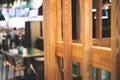 View of modern food court food hall interior in the big shopping mall, different fast food cafes and restaurants with wooden and Royalty Free Stock Photo