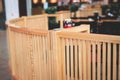 View of modern food court food hall interior in the big shopping mall, different fast food cafes and restaurants with wooden and Royalty Free Stock Photo