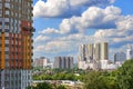 View of modern Moscow cityscape with a new building under construction with workers on a construction cradle Royalty Free Stock Photo