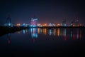 View of the modern port with many lights that are reflected in the water. Night shot. Royalty Free Stock Photo