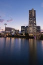 View of the modern skyline in Minato Mirai, Yokohama during the sunset in front of the waterfront. Portrait orientation Royalty Free Stock Photo