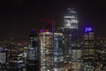 View of modern skyscrapers with lights under a night sky in London from the Broadgate tower Royalty Free Stock Photo
