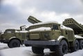 View of modern types of multiple rocket launchers in the parking lot after snowfall