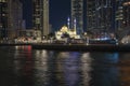 View Mohammed Bin Ahmed Al Mulla Mosque at night. Dubai Marina.