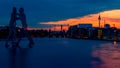 View on the Molecular men with TV tower at sunset in Berlin, Germany