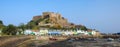 View of Mont Orgueil Castle above the colorful fishing village of Gorey