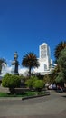 View of the Montalvo Park with the church of the Cathedral of the city of Ambato in the background