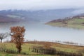 View of Montedoglio lake Tuscany, Italy with mist above it