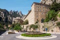 View of Montserrat monastery at noon. Main entrance. Montserrat mountains in the background