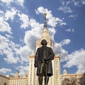 View of the monument to Mikhail Vasilyevich Lomonosov from building of Moscow State University MSU, on the background of the sky,