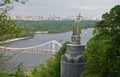 View of the monument to Vladimir the Baptist and the pedestrian bridge in Kiev Royalty Free Stock Photo