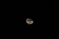 View Of Moon Against Sky At Night. Half moon on an isolated black background.