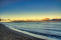 Moonset over Lanai from Baby Beach on Maui .