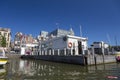 View of the mooring of pleasure boats on Damrak Street in Amsterdam